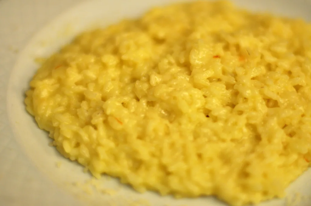 Golden saffron risotto alla milanese in a bowl